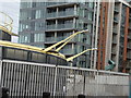 Artistic street lighting on the roundabout to the Excel Centre