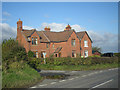 Houses beside the road to Crudgington