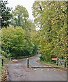 Gateway and access road to Manor Farm from Pylands Lane