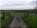 SP8343 : Gated Road and Stile, Haversham by mick finn