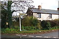 Old signpost, and house, at  Llanishen Cross