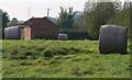 Barn and bales next to Castle View Road