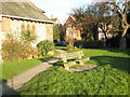 Seat in the churchyard of St James the Great, East Ham Road