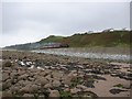 Train running along Llandanwg beach