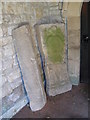 NY9166 : Grave slabs in the porch of St. Michael's Church, Warden (2) by Mike Quinn