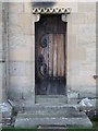 NY9166 : Door in the south wall of the chancel, St. Michael's Church, Warden by Mike Quinn