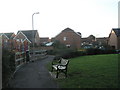 Seat by the playpark in Milebush Road Recreation Ground