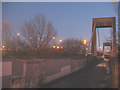 TQ4780 : Thamesmead footbridge at dusk by Stephen Craven