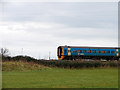 SH5727 : An Arriva Wales train southbound from Pensarn by John Lucas
