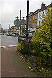 TQ2389 : Railings and Bell Lane by Martin Addison