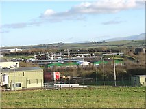 SH4674 : The recently closed Eastman Peboc plant seen past that of Glanbia Cheese by Eric Jones
