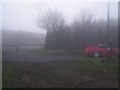 North Downs Way crosses Farm Road in Winter Fog