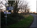 SY7389 : West Knighton: signpost at Tenantrees by Chris Downer