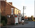 Riding past the post office