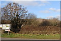 Road sign with Ugborough Beacon in the background