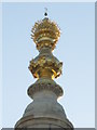 The gilded top of the Monument