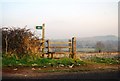 Stile & footpath sign off the B3178