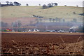 View across ploughed fields of Bogindollo hamlet