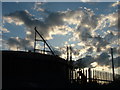 Gasholder silhouetted