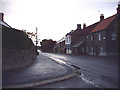 NU0139 : Main St, Lowick - Looking East by Colin Kerr