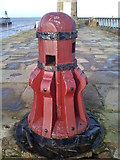 NZ9011 : Capstan, Whitby East Pier by Neil Reed