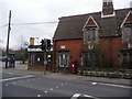 SZ0698 : Longham: postbox № BH22 63 and old post office by Chris Downer