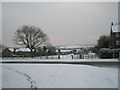 Looking across Leominster Road towards Church Field