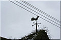 Weather vane on the roof