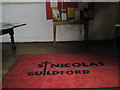 Welcome mat in the church porch at St Nicolas, Guildford