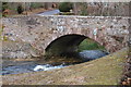 Melgam Water flows under the road Bridge at Bridgend of Lintrathen Village