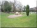 Circular seat in Ropley Churchyard