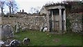 Grim edifice in churchyard