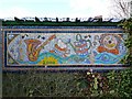 Mosaic near to the canal entrance of the Willowtree Marina