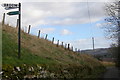 Signpost on the Glen Ogil / Tannadice Road depicting 