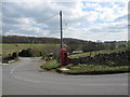 Telephone Box and road signs at Sparklow