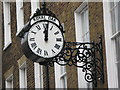 Clock on an office in John Street, WC1