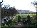 SK2860 : Stile, footpath and River Derwent by Peter Barr