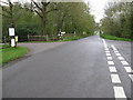 Road junction and entrance to Bignor Park