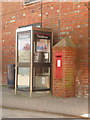 Barton on Sea: postbox № BH25 124 and phone, Bartonside Road