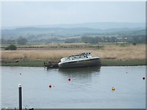SX9687 : Abandoned boat by River Exe opposite Topsham by David Smith