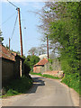 TG1423 : Perrys Lane past Beechwood Farm and Barn by Evelyn Simak