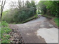 Footpath meets road at hairpin bend at Riverhill