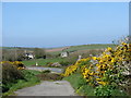 The disused windmill at Glan Rhyd from a disused section of the A5025