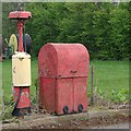Old petrol pump and oil cabinet
