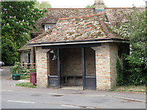 TL4055 : Bus shelter in Barton near the village pond by Michael Trolove