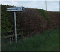 Road sign - Dundrennan 1 mile