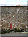 Barn wall with Victorian letterbox