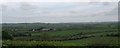 View across farmland in the direction of Hendrefor Farm, Llansadwrn