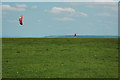 SO9924 : Kite surfing on Cleeve Hill by Philip Halling