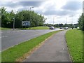 Sign on approach to roundabout at Robroyston